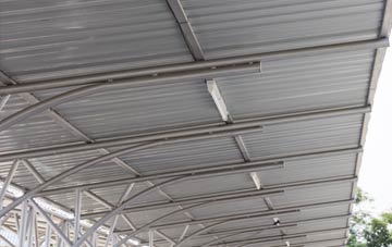 installing New Moat metal roofing